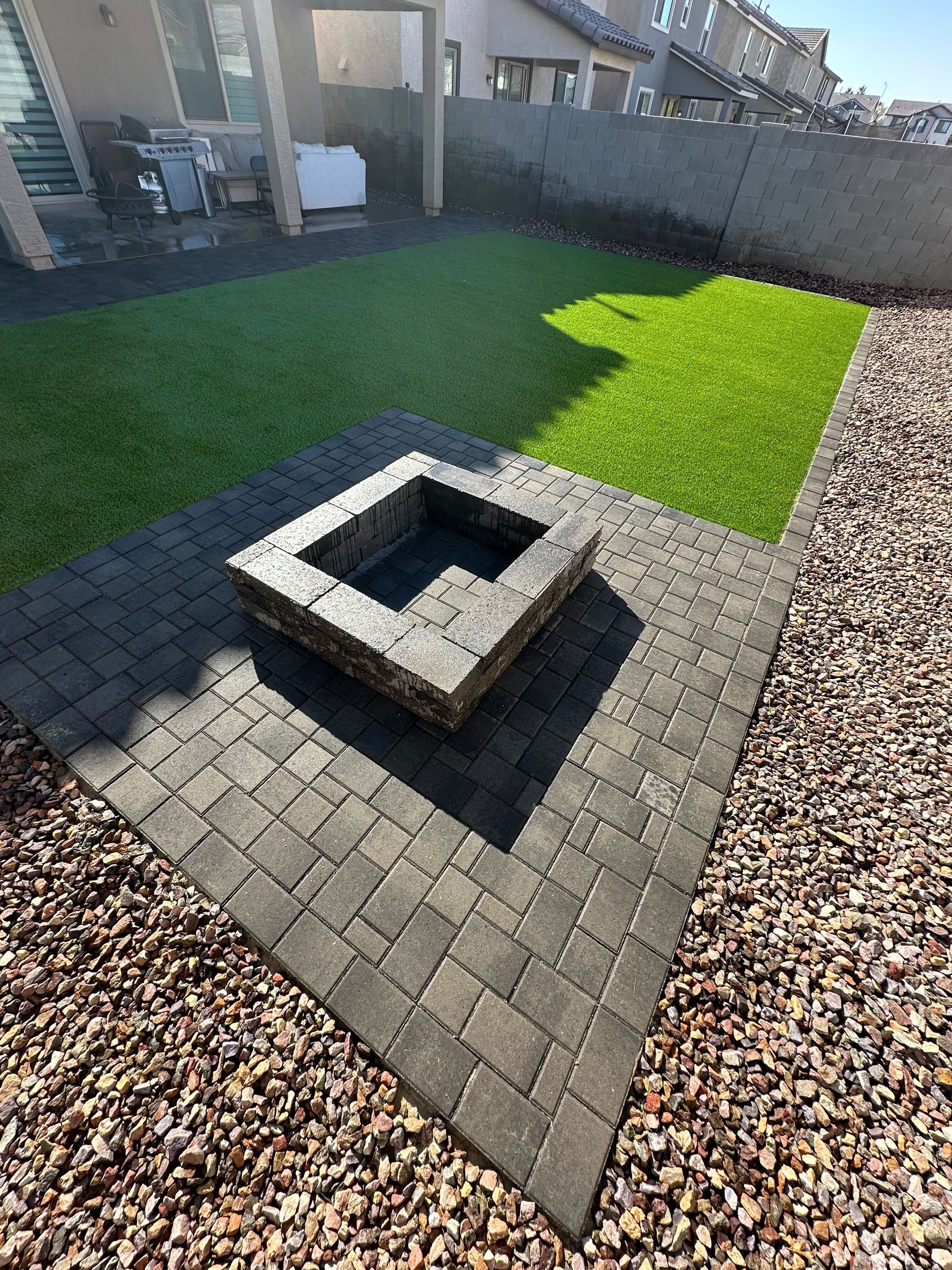 Outdoor entertainment area with custom kitchen and seating